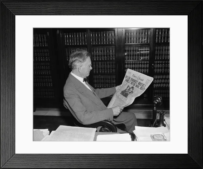 Framed Print : Senator Borah reads Times Herald headline about Hitler. April 28, 1939. The headline reads, Hitler Denounces Roosevelt: Cancels British Naval Treaty Framed Print : Senator Borah reads Times Herald headline about Hitler. April 28, 1939. The headline reads, Hitler Denounces Roosevelt: Cancels British Naval Treaty