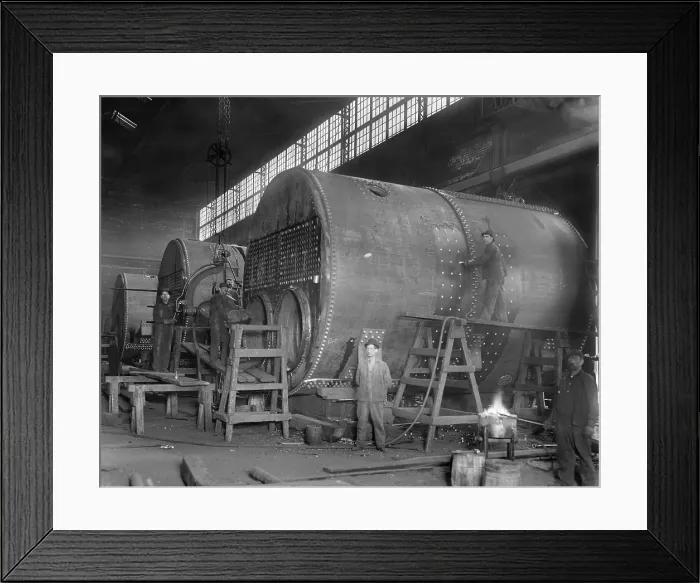 Framed Print : Steam ship boilers under construction in Wyandotte, Michigan in 1912. The massive coal fired boilers were 14 in diameter