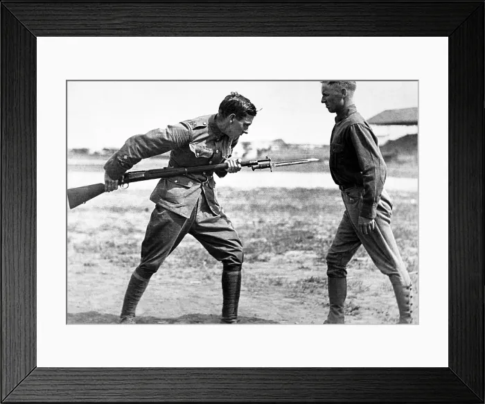 Framed Print : Americans receiving bayonet fighting instruction by an English Sgt. Major. At the beginning of World War I, the under staffed U.S. Army welcomed experienced British trainers