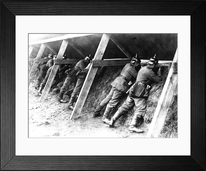 Framed Print : World War I German soldiers in their protected trenches on the Belgian frontier. The troops are aiming at the enemy. 1914-1918