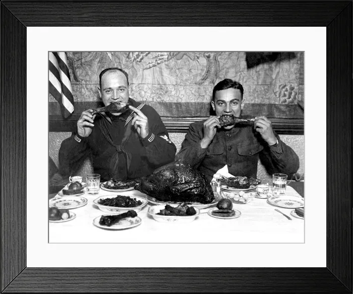 Framed Print : World War I service men enjoy a publically hosted Thanksgiving dinner in New York City. 1918