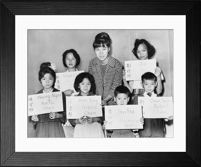 Framed Print : Six Chinese children who recently arrivaled from Hong Kong and Formosa, hold placards giving their Chinese name in both Chinese ideographs and transliteration