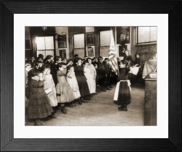 Framed Print : Immigrant children saluting the flag in the Mott Street Industrial School, N.Y.C. 1889 photo by Jacob Riis