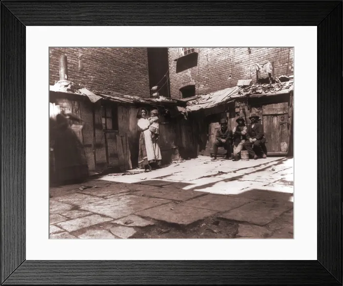 Framed Print : Paved yard lines with outdoor latrines in one of the city's worst slums on Jersey Street, where poor Italians immigrants lived in New York. 1889 photograph by Jacob Riis Framed Print : Paved yard lines with outdoor latrines in one of the city's worst slums on Jersey Street, where poor Italians immigrants lived in New York. 1889 photograph by Jacob Riis