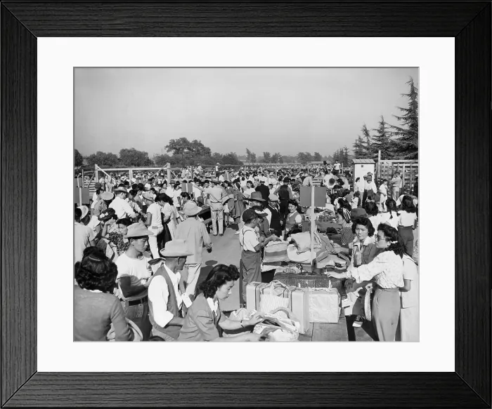 Framed Print : Japanese-Americans at the Santa Anita Assembly Center where family groups identify their baggage prior to departure to the relocation camps that would be their homes for