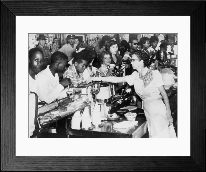 Framed Print : African American being served at Kress Store restaurant after a successful two-day sit-in broke racial discrimination in Oklahoma City. August 22, 1958 Framed Print : African American being served at Kress Store restaurant after a successful two-day sit-in broke racial discrimination in Oklahoma City. August 22, 1958