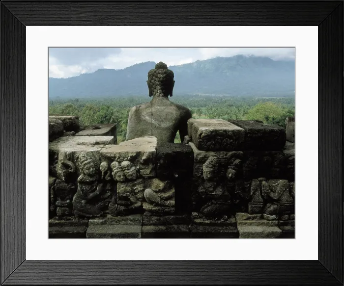 Framed Print : Borobudur Temple. 9th c. INDONESIA. CENTRAL JAVA. Borobudur. The roof of the temple wiht a Buddha statue. Eastern Art. Architecture