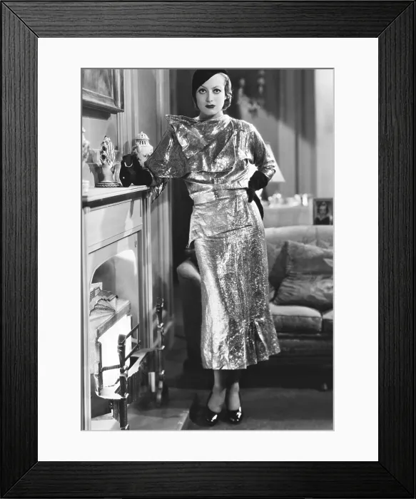 Framed Print : LETTY LYNTON, Joan Crawford, (in a silver brocade dinner dress by Adrian), 1932