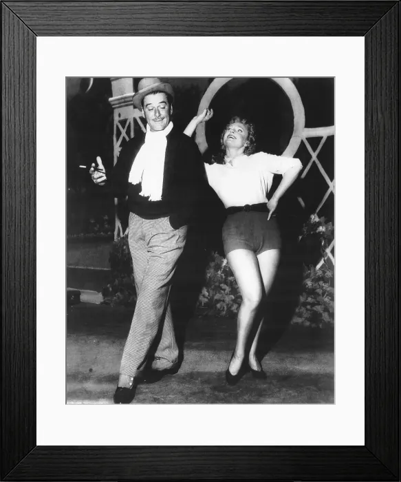 Framed Print : LET'S MAKE UP, (aka LILACS IN THE SPRING), from left, Errol Flynn, Anna Neagle, 1954 Framed Print : LET'S MAKE UP, (aka LILACS IN THE SPRING), from left, Errol Flynn, Anna Neagle, 1954