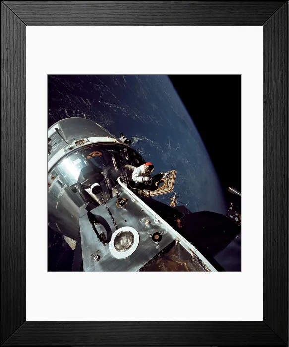 Framed Print : Apollo 9 astronaut Dave Scott stands in the open hatch of the Command Module, docked to the Lunar Module in Earth orbit Framed Print : Apollo 9 astronaut Dave Scott stands in the open hatch of the Command Module, docked to the Lunar Module in Earth orbit