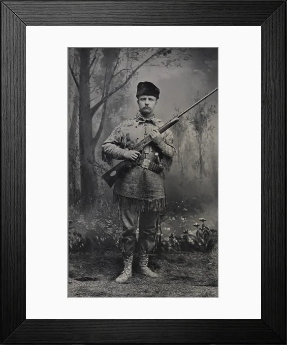 Framed Print : Young Theodore Roosevelt dressed in deer skins posing with a rifle in an 1885 studio portrait Framed Print : Young Theodore Roosevelt dressed in deer skins posing with a rifle in an 1885 studio portrait