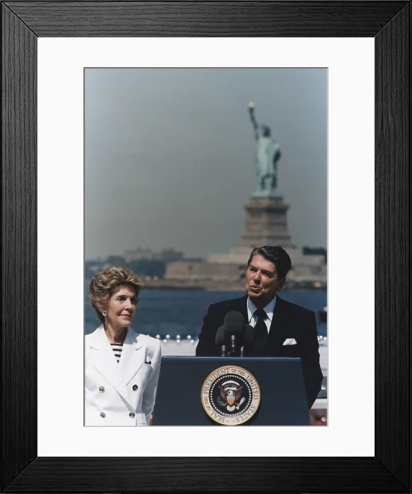Framed Print : President Reagan giving a speech on the Centennial of the Statue of Liberty Governor's Island New York. July 4 1986. PO-USP-PAT-Reagan_NA-12-0090M