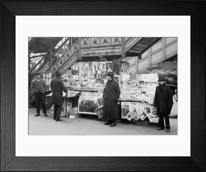 Framed Print : A sidewalk newsstand in New York City displaying a rich variety of periodicals published at the turn of the century