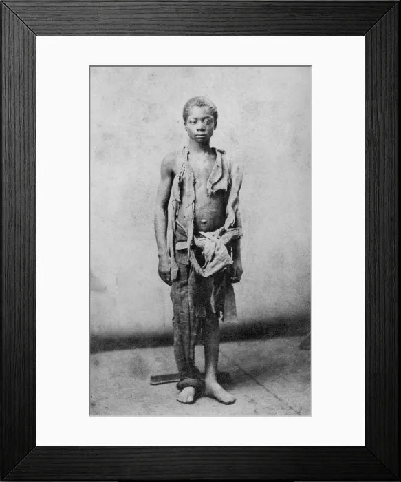 Framed Print : Young slave during the civil war reduced to such poverty he is wearing only rags. Ca. 1863. is wearing only rags. Ca. 1963. salem, Virginia