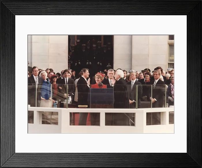 Framed Print : President Reagan being sworn in on Inaugural Day U.S. Capitol. Chief Justice Warren Berger leads the ceremony as Nancy Reagan holds the Bible