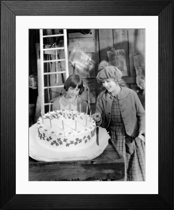 Framed Print : LITTLE ANNIE ROONEY, Mary Pickford (r), with her niece, Mary Pickford (l) celebrating her birthday, on-set, 1925