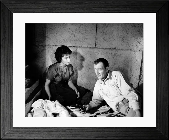 Framed Print : LEGEND OF THE LOST, from left, Sophia Loren, John Wayne, 1957 Framed Print : LEGEND OF THE LOST, from left, Sophia Loren, John Wayne, 1957