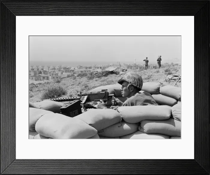 Framed Print : US Marine in a foxhole in Beirut, Lebanon. The United States intervened to prevent conflict between the Pro-western Maronite Christians and Muslims Arab nationalists. July 1958