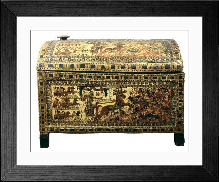 Framed Print : Painted chest depicting a king on his chariot attacking an enemy. ca. 1340 BC. Found at the Treasure of Tutankhamun. Painted wood. Small chest for sandals. Egyptian art