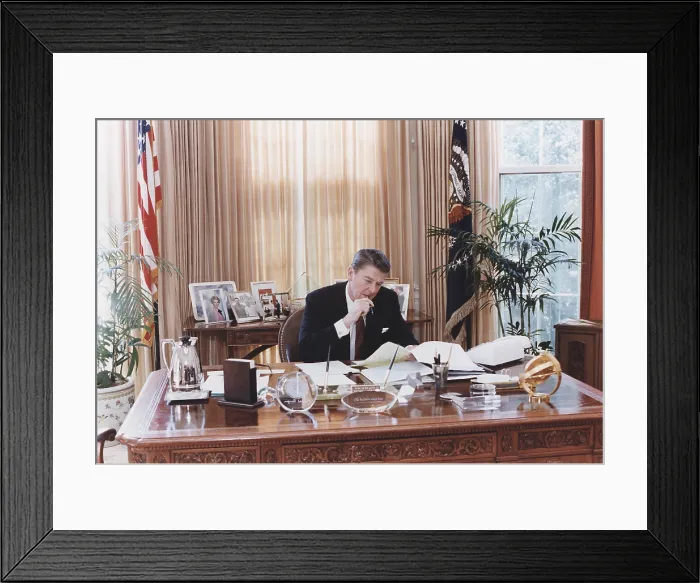 Framed Print : President Reagan working at his Oval Office desk shortly before delivering his 1982 State of the Union address to Congress. Jan 26 1982. PO-USP-Reagan_NA-12-0094M