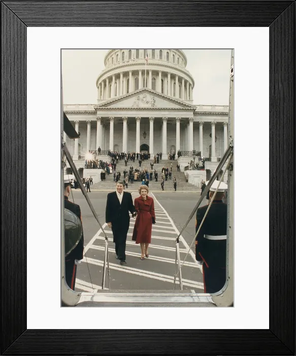 Framed Print : President and Nancy Reagan boarding the Helicopter to leave the U.S. Capitol on the last day of the administration. In the background are President and Barbara Bush and the U.S Framed Print : President and Nancy Reagan boarding the Helicopter to leave the U.S. Capitol on the last day of the administration. In the background are President and Barbara Bush and the U.S