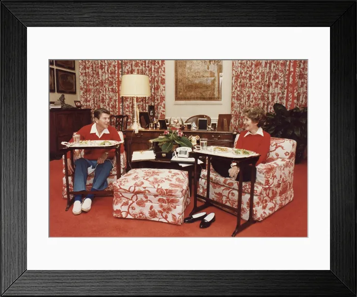 Framed Print : President and Nancy Reagan eating on TV trays in the White House living quarters. November 6 1981. PO-USP-Reagan-Nancy_NA-12-0152M
