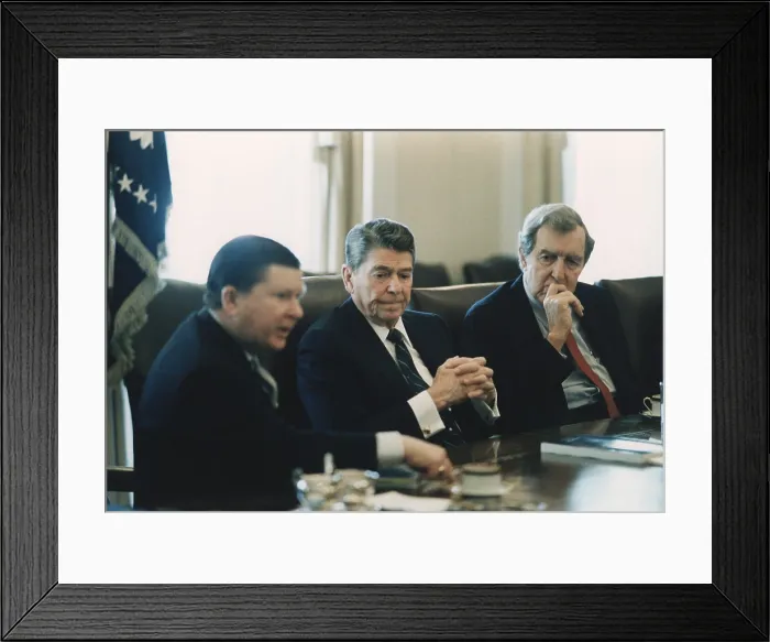 Framed Print : President Reagan receiving the Tower Commission Report the results of an investigation of the Iran-Contra affair in which Reagan Administration secretly sold arms to Iran Framed Print : President Reagan receiving the Tower Commission Report the results of an investigation of the Iran-Contra affair in which Reagan Administration secretly sold arms to Iran