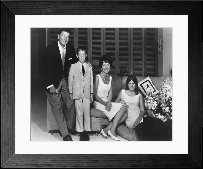 Framed Print : Family portrait taken when Ronald Reagan was Governor of California. Left to right are Governor Reagan Ron Junior Mrs. Reagan and Patti Davis. Ca. 1967 (BSLOC_2011_2_1)