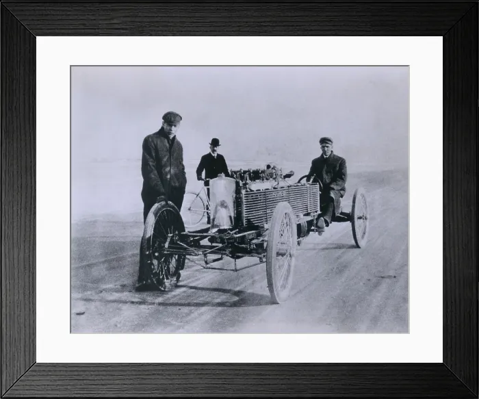 Framed Print : Henry Ford and August Degener with their six cylinder Ford racer at Daytona Beach in 1905