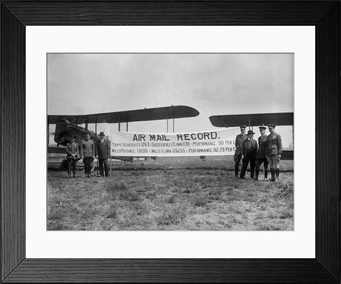 Framed Print : Post Master General Albert S. Burleson with officers from the Army-Air Force commemorate the first year of Air Mail in the United States. May 19 1919. LC-DIG-npcc-18659