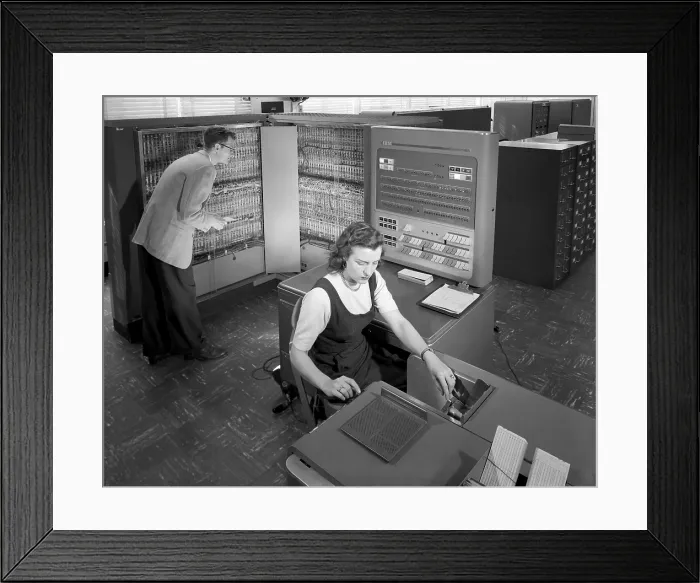 Framed Print : Technicians working with room size IBM type 704 computer making calculations for aeronautical research. NASA Langley Research Center, March 21, 1957 Framed Print : Technicians working with room size IBM type 704 computer making calculations for aeronautical research. NASA Langley Research Center, March 21, 1957