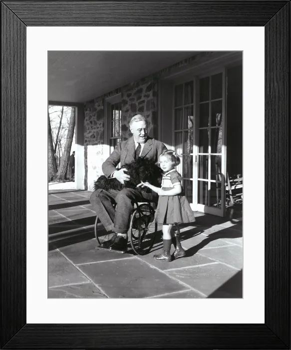 Framed Print : President Roosevelt in his wheelchair on the porch at Top Cottage in Hyde Park NY with Ruthie Bie and Fala. Photo was taken by FDR's cousin Margaret Suckley in February 1941