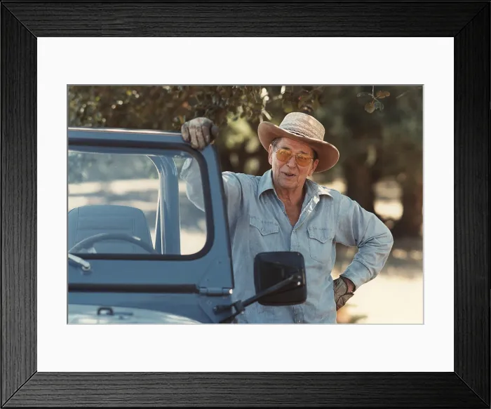 Framed Print : President Reagan doing chores during vacation at his California home Rancho Del Cielo. Aug 31 1985. (BSLOC_2011_2_2) Framed Print : President Reagan doing chores during vacation at his California home Rancho Del Cielo. Aug 31 1985. (BSLOC_2011_2_2)