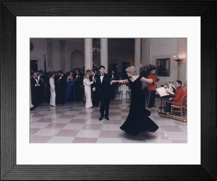 Framed Print : Princess Diana dancing with John Travolta after a White House dinner for the Prince and Princess of Wales. Nov. 9 1985. (BSLOC_2011_2_23)