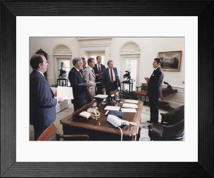 Framed Print : President Reagan and his White House staff discussing the assassination of Egyptian President Anwar Sadat. Oct. 6 1981. (BSLOC_2011_2_6)