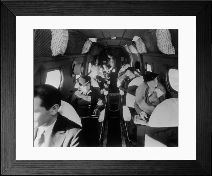 Framed Print : Stylishly dressed passengers seated in a commercial flight in the 1930s. LC-DIG-hec-14562