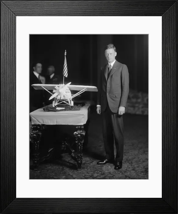 Framed Print : Charles Lindbergh 1902-1974 photographed beside a model of THE SPIRIT OF ST Framed Print : Charles Lindbergh 1902-1974 photographed beside a model of THE SPIRIT OF ST