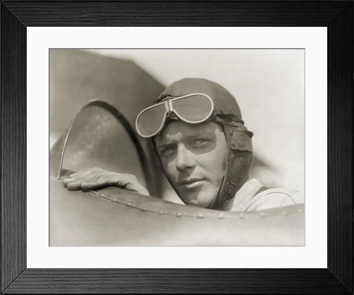 Framed Print : Charles Lindbergh 1902-1974 wearing a helmet with goggles up in open cockpit of airplane at Lambert Field St. Louis Missouri. Ca. 1928. LC-USZ62-68852