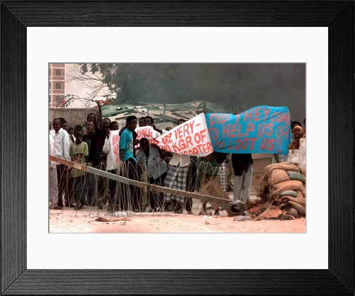 Framed Print : Somali civilians protest the presence of U.N. mostly U.S. forces in Mogadishu at the U.S. Embassy in Somalia