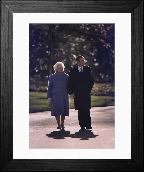 Framed Print : President George and Barbara Bush take a last walk around the White House Grounds on Jan. 20 1993. (BSLOC_2011_3_93)