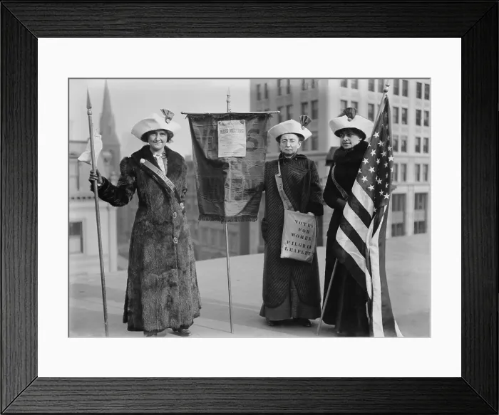 Framed Print : Three suffragettes demonstrate in New York City to promote Suffrage Hike of 1912 from Manhattan to Albany and distribute their VOTES FOR WOMEN PILGRIM leaflets