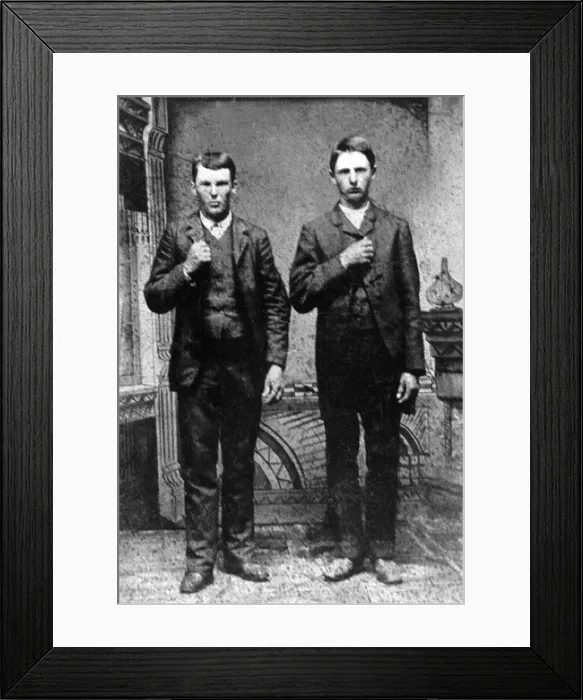 Framed Print : Brothers in crime, Jesse and Frank James in identical formal posees. Frank, on right, was Jesse's older brother and retired from crime after Jesse's 1882 death. Ca. 1860s Framed Print : Brothers in crime, Jesse and Frank James in identical formal posees. Frank, on right, was Jesse's older brother and retired from crime after Jesse's 1882 death. Ca. 1860s