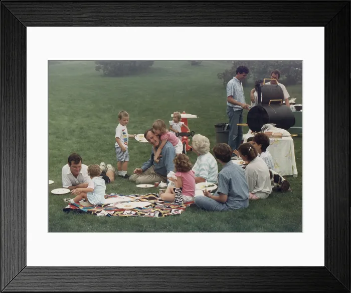 Framed Print : Vice President Bush picnics on the lawn of his Kennebunkport home with his family including many young grandchildren. Ca. 1984. (BSLOC_2011_3_98) Framed Print : Vice President Bush picnics on the lawn of his Kennebunkport home with his family including many young grandchildren. Ca. 1984. (BSLOC_2011_3_98)