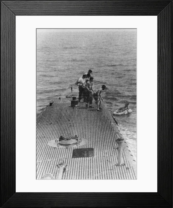 Framed Print : Lt. George Bush was rescued by the submarine USS. Finback after being shot down bombing the Japanese held Island of Chi Chi Jima. Two other crew members died in the incident