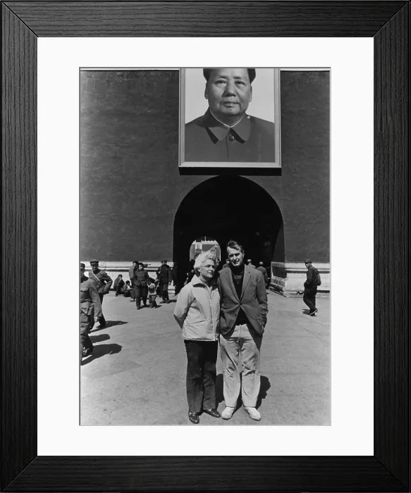Framed Print : George and Barbara Bush pose beneath a portrait of Mao Zedong in Beijing when he was United States Liaison to China. Ca. 1974 (BSLOC_2011_3_101) Framed Print : George and Barbara Bush pose beneath a portrait of Mao Zedong in Beijing when he was United States Liaison to China. Ca. 1974 (BSLOC_2011_3_101)
