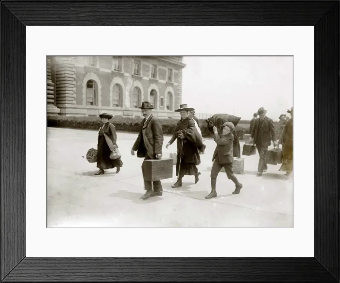 Framed Print : European immigrants arriving at Ellis Island, ca. 1920, some of the last to enter after World War I, when the United States set national quotas greatly reducing immigration. 1920