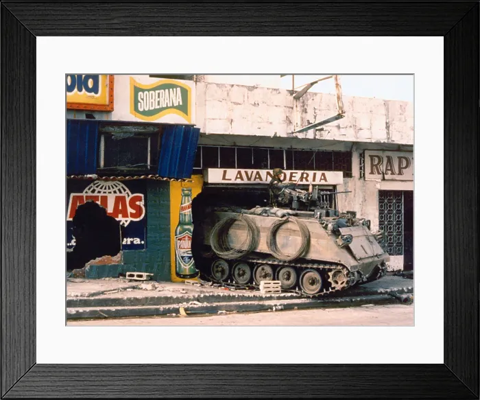 Framed Print : A U.S. Army armored personnel carrier finds shelter in a destroyed Panama City laundromat. Dec. 1989. (BSLOC_2011_3_21)