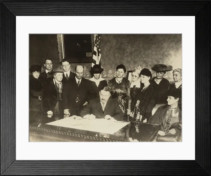 Framed Print : Men and women witness as Colorado governor, Oliver H. Shoup, signs a ratification document for the 19th amendment granting woman's suffrage. Dec. 12, 1919 Framed Print : Men and women witness as Colorado governor, Oliver H. Shoup, signs a ratification document for the 19th amendment granting woman's suffrage. Dec. 12, 1919