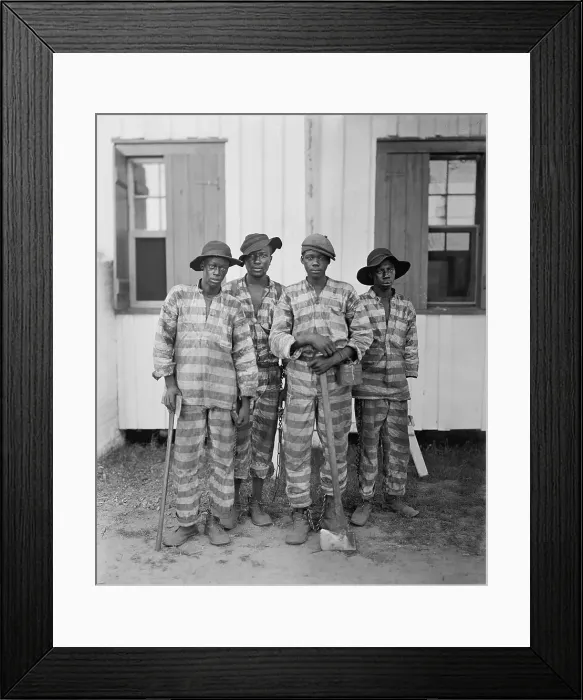 Framed Print : Four African American youths in a Southern chain gang. Southern jails made money leasing convicts for forced labor in the Jim Crow South. Circa. 1900 Framed Print : Four African American youths in a Southern chain gang. Southern jails made money leasing convicts for forced labor in the Jim Crow South. Circa. 1900