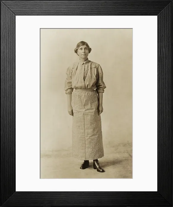 Framed Print : Suffragist Abby Scott Baker, models a prison dress. She was imprisoned for picketing in Washington, D.C